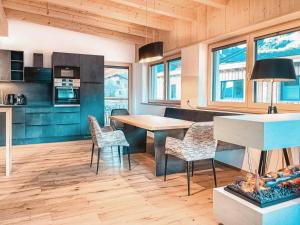 Η κουζίνα ή μικρή κουζίνα στο VIVAZILARE Loft - AlpenLuxus Collection +32 φωτογραφίες