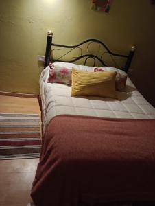 Säng eller sängar i ett rum på Las Dueñas