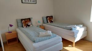 Voodi või voodid majutusasutuse Olafsvik Guesthouse toas