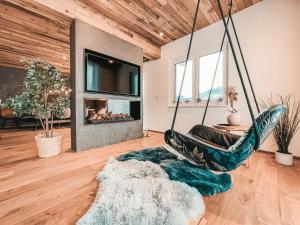 A seating area at CLOUD 9 - Private Roof Terrace with Whirlpool by AlpenLuxus Appartements