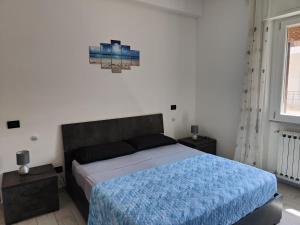 Posteľ alebo postele v izbe v ubytovaní Casa Trezza