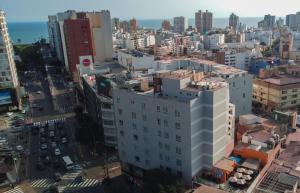 an aerial view of a city with tall buildings at MIRAFLORES CITY HOTEL in Lima