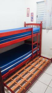 Un ou plusieurs lits superposés dans un hébergement de l'établissement Casa - Temporada