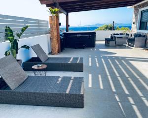 Gallery image of ODYSSEA Top View & Hot Jacuzzi Front Beach in Kremasti