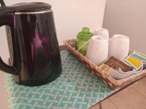 Příslušenství pro přípravu čaje a kávy v ubytování NOVOS Departamentos Temporarios Catamarca apart + 18 fotografií