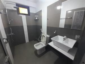 Ett badrum på Ella South Star