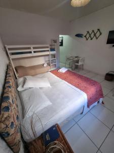 Postel nebo postele na pokoji v ubytování Estalagem Maceió