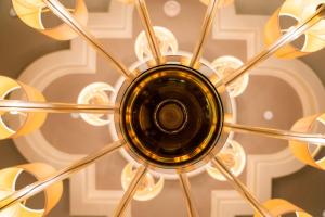 a chandelier hanging from a ceiling at The St. Regis Houston in Houston