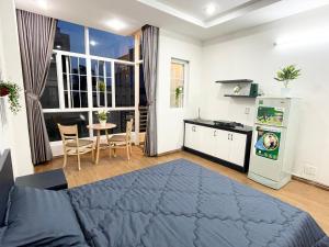 Kuchyň nebo kuchyňský kout v ubytování Cali Homestay
