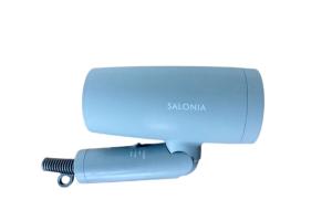 a blue hair dryer on a white background at awa guesthouse in Tateyama