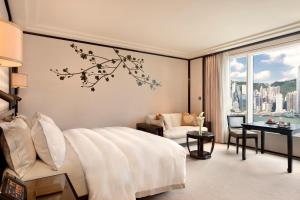 Letto o letti in una camera di The Peninsula Hong Kong