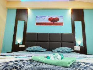 Postel nebo postele na pokoji v ubytování Hotel Nakshatra Resort