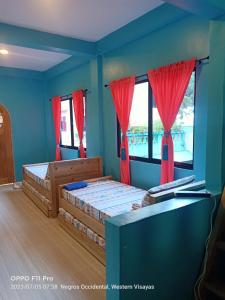 Postel nebo postele na pokoji v ubytování SmallFry's Beach Resort