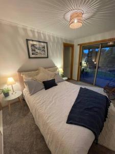 Säng eller sängar i ett rum på Bogaroo Cottage
