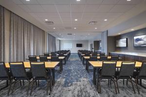 a conference room with tables and chairs in it at Courtyard St. Louis Brentwood in Richmond Heights