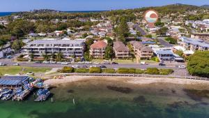 an aerial view of a resort with a marina at Villa Forster - 1/14-16 Robert Street, Forster in Forster