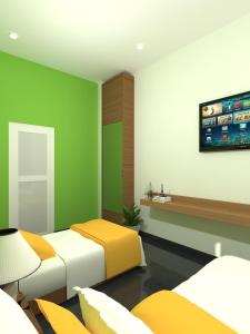 TV o dispositivi per l'intrattenimento presso The Cabin Hotel Mantrijeron