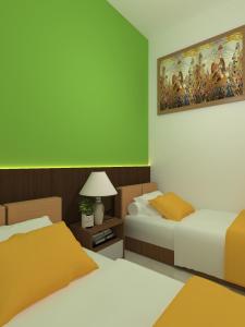 Letto o letti in una camera di The Cabin Hotel Mantrijeron