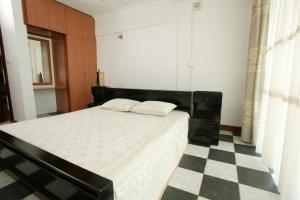 Postel nebo postele na pokoji v ubytování Ivys Hotel