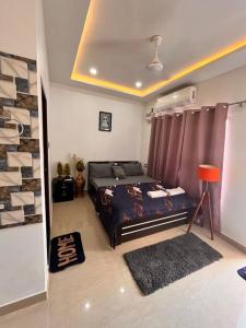 Voodi või voodid majutusasutuse Light House, Unique & Cozy 2bhk toas