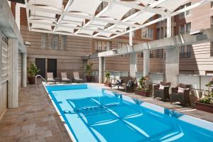 a swimming pool on the rooftop of a building at Westin Georgetown, Washington D.C. in Washington