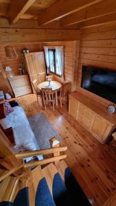 an overhead view of a living room in a log cabin at Borowa Chatka in Borowy Młyn