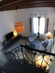 an aerial view of a living room with a couch and a table at Bienvenido a Chez Matu in Capdepera