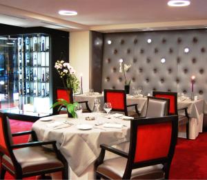 Restoran või mõni muu söögikoht majutusasutuses Hotel Palladia