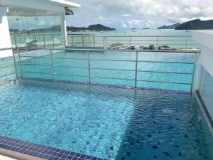 a swimming pool on the top of a cruise ship at Summer View Apartment + Sky pool in Kuah