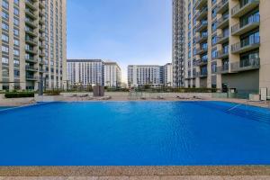 Bazén v ubytování ALH Vacay - Fully Furnished 1 BR in Dubai Hills Park Heights nebo v jeho okolí