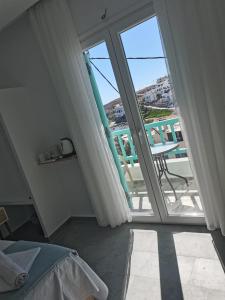 Aetherian Suites客房内的一张或多张床位