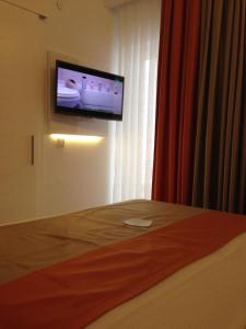 TV a/nebo společenská místnost v ubytování Doc's Hotel Kemer