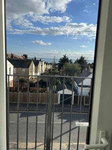 a view of a street from a balcony at Apartment with Balcony Sea Views with parking - Sleeps 4 in Westcliff-On-Sea