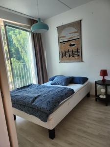Postel nebo postele na pokoji v ubytování Cozy holiday home