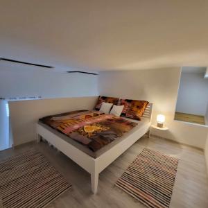 a bedroom with a bed in a room at City Bell in Székesfehérvár