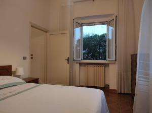 Ένα ή περισσότερα κρεβάτια σε δωμάτιο στο Casa Macoca