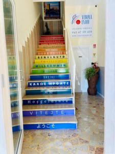 a set of stairs with colorful books on them at Verona Enjoy in Verona
