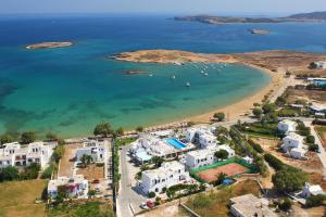 an aerial view of a beach with white buildings at Contaratos Beach Hotel in Naousa