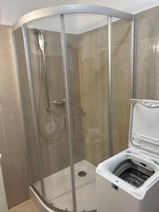 Kúpeľňa v ubytovaní Kondé Apartments C + 17 fotografií