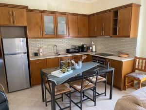 Kuchyň nebo kuchyňský kout v ubytování LenasApartment