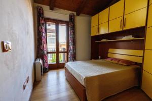 A bed or beds in a room at Casa Lilla 1 e 2