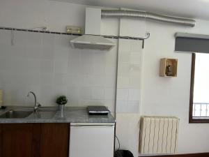 Kuchyň nebo kuchyňský kout v ubytování Hotel Al-Andalus