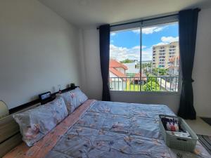 Postel nebo postele na pokoji v ubytování Boxsoon Nimman 6 # 3beds 4bahts