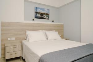 EDEL Luxury Apartments客房内的一张或多张床位