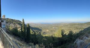 a view of a valley from a hill at Panorama rooms in Chios