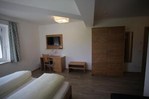 Voodi või voodid majutusasutuse Gästehaus Watschinger toas