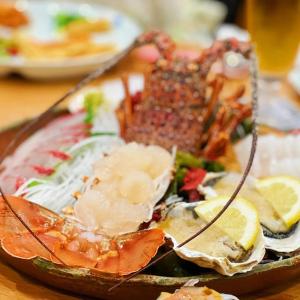 a plate of food with seafood on a table at Open House Sakurasakura - Kamakurayama - - Vacation STAY 14043 in Kamakura