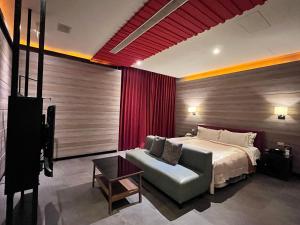 Postel nebo postele na pokoji v ubytování Moonlight Motel