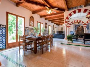 a dining room with a table and chairs at Holiday Home Les Ecuries by Interhome in Alet-les-Bains +31 photos