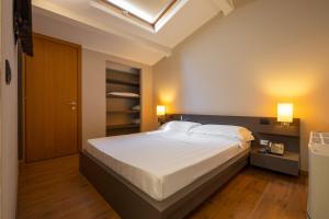 Posteľ alebo postele v izbe v ubytovaní Hotel Villa Betania